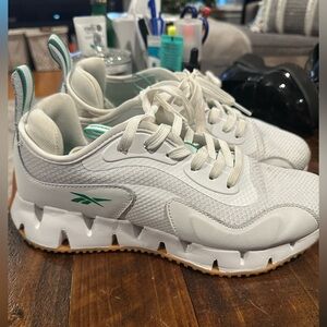 Reebok white sneakers with green accents